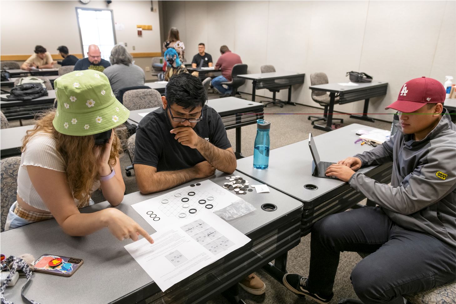 Tri Cities students in English 402 work in teams to rewrite gaming instructions to be inclusive, understandable to all ages and abilities.