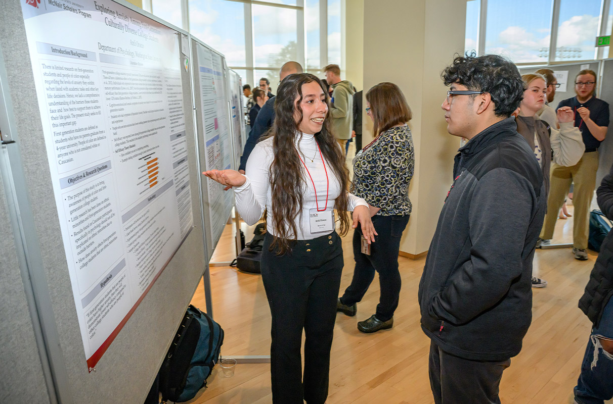 McNair scholar Areli Orozco presents at SURCA. Photo by Bob Hubner, WSU Photo Services.